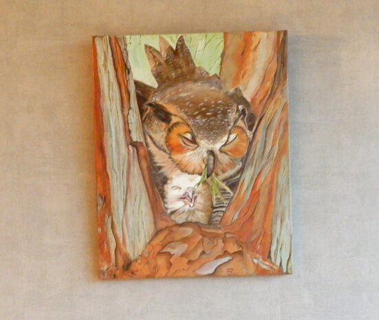 Schilderij uil (oehoe) met jong in boomholte 40 x 50 cm.